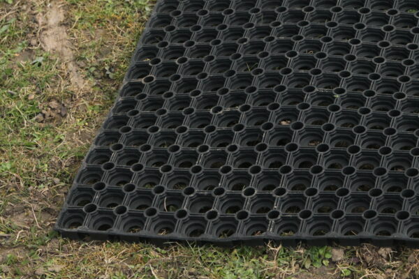 1m x 1.5m x 22mm hollow mat lid onto grass