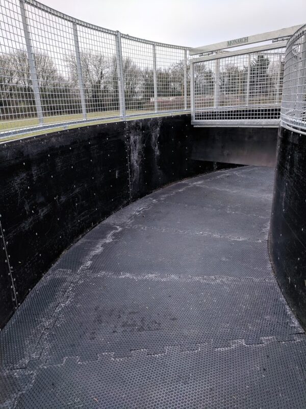 36ftdia x 6ft6in WW Horsewalker Matting laid into a walker with rubber walls