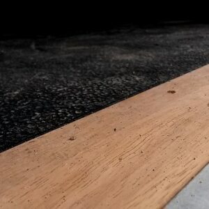 Hardwood ramp edge going from 5mm to a 17mm Amoebic mat