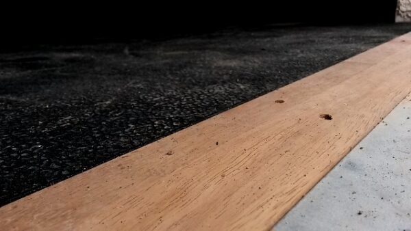 Hardwood ramp edge going from 5mm to a 17mm Amoebic mat