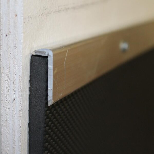 10mm EVA installed on a wooden wall with a anti-Chew capping installed