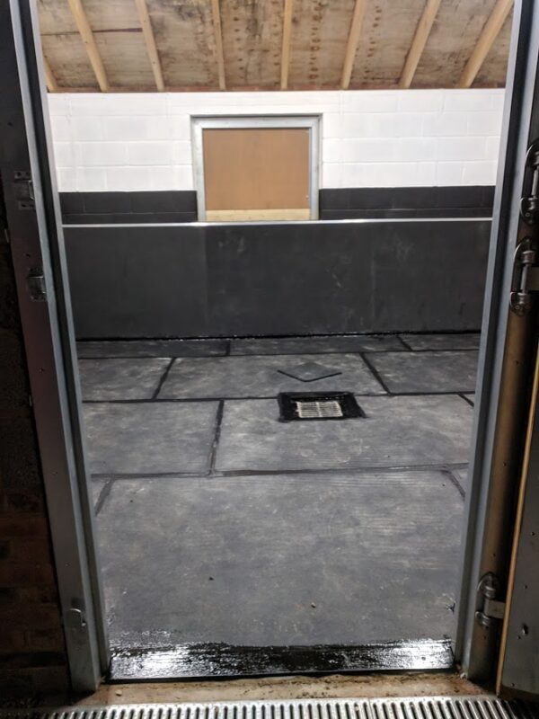 17mm easy sweep black mats fully sealed on the floor with a centre drain and 10mm EVA wall mats for an ulitmate stable