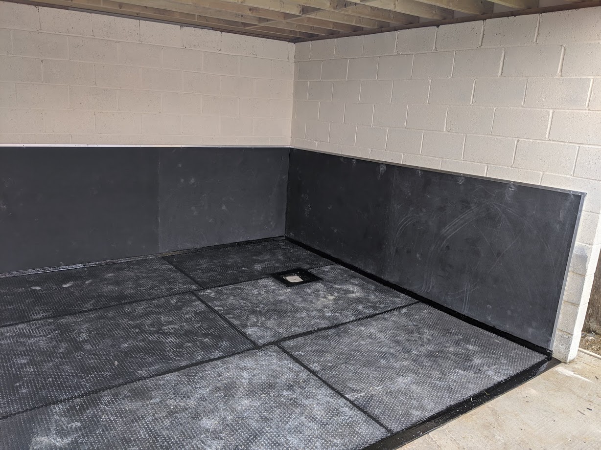 washbay fitted with fully sealed flooring and EVA wall mats
